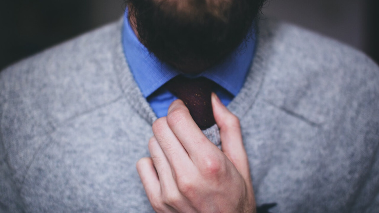 Beard Growth Tips guy with a beard wearing a tie