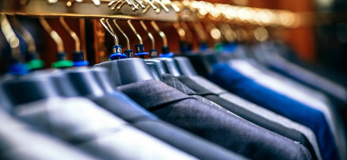 Rack full of suits how best clean your suits a blog post from Jaxson Maximus Miami