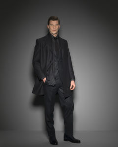man wearing a black suit for Jaxson Maximus suit guide