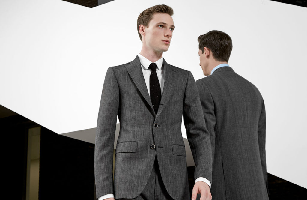 Man wearing a grey suit for Jaxson Maximus suit color guide